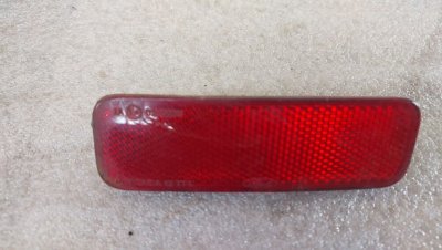 Відбивач, катафот в задній бампер лівий Ford Transit Custom 12+ Ford Transit 14+ BK21515C0AA Форд Транзит Кастом