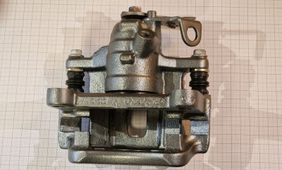 Суппорт задній правий ВІДНОВЛЕНИЙ в зборі 1.9DCI, 2.0DCI, 2.5DCI 7701056165 Рено Трафік, Опель Вівар