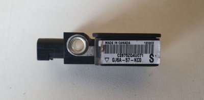Датчик удару боковий 2002-2007 GJ6A57KC0 Мазда 6