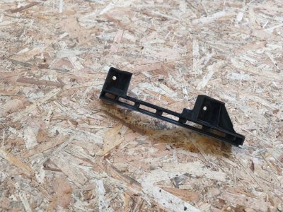 Кронштейн переднього бампера лівий VW 1T0807889B VAG Фольксваген Кадді